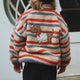 Konges Slojd børnefleece med broderet Joddy Teddy Tangerine Stripe-print